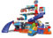 VTech - Tut Tut Bolides Série Pro, Maxi Garage Interactif avec Voiture Dépanneuse Iris à Votre Service, Garage Voitures, 6 Zones Magiques, Cadeau Enfant de 2 Ans à 6 Ans - Contenu en Français