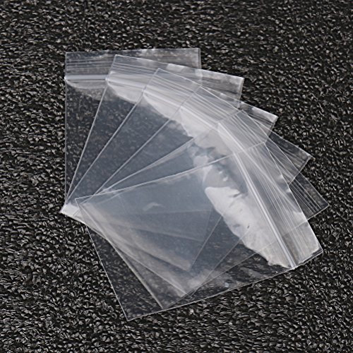Plastic Seal Bags, 100 pcs Small Clear Storage Pouches Resealable Poly Zip Lock Bags for Kitchen Storage, Jewellery, Small Cookies and Sweets(50 x 70mm/2.75 x 1.97 inch)