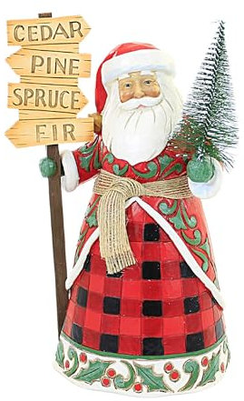 Weihnachtsmann mit Baum und Schild