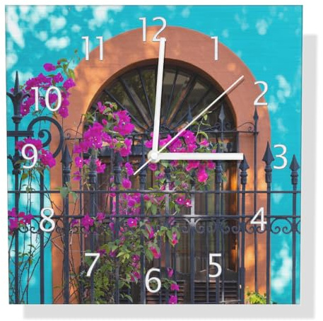 Wallario Design Wanduhr Pinke Blumen vor türkisfarbener Fassade aus Aluverbund, Alu-Uhr Größe 30 x 30 cm, weiße Zeiger mit Metalloptik