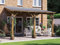 Dunster House Wooden Lean-To Gazebo Kit 13' x 10' – Wall-Mounted Garden Shelter & Canopy – Durable, Stylish Outdoor Structure for Patios, Decking or Seating – Leviathan