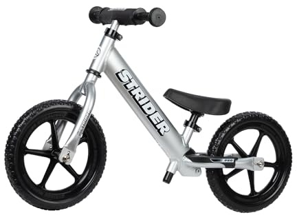 Strider 12” Pro Bike, Silver - No Pedal Balance Bicycle for Kids 1 to 4 Years - Includes Safety Pad, Padded Seat, Mini Grips & Flat-Free Tires - Tool Free