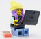 LEGO Côté caché : Parker avec téléphone portable et ordinateur portable