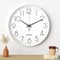 Uootach Reloj de Pared, 30CM Movimiento de Cuarzo silencioso, diseño Minimalista Moderno (Blancos Caracteres Negro)