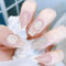 EOAMGO 24 pcs Christmas Nails False Nails Long with Snow Pattern, Press on Nails Christmas Fake Nails with Glue, Stick on Nails for Women and Girls DIY French Tips Nails (Nude White, One Size)