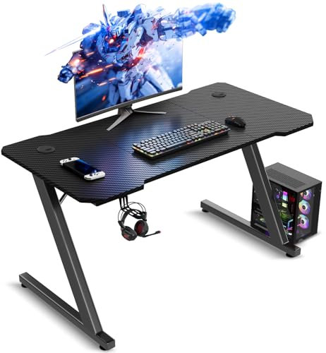 TRIUMPHKEY Mesa Gaming 100 x 60 cm, Escritorio Gaming en Forma de Z Ergonómica, Mesa Gamer de Fibra de Carbono, Mesa para Ordenador con Gancho para Auriculares, Negro