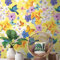 Livingwalls Vliestapete - Tapete Blumen in Gelb, Blau und Weiß - Wandtapete für verschiedene Räume - Wandbild XXL 2,80 m x 1,59 m