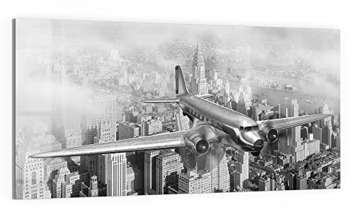 DEQORI Glasbild Echtglas | Motiv Flugzeug über Stadt | horizontal einteilig 100x50 cm | schöne Dekoration | Wandbild für Wohnzimmer, Schlafzimmer, Flur & Küche | moderne Wanddeko
