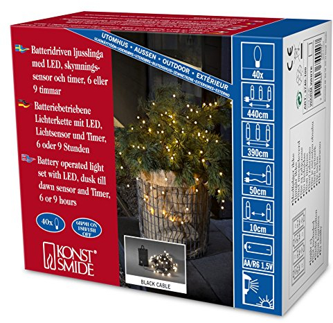 Konstsmide 3740-100 LED Globelichterkette mit runden Dioden / für Außen (IP44) / Batteriebetrieben: 4xAA 1.5V (exkl.) / mit Lichtsensor, 6h und 9h Timer und Schalter / 40 warm weißen Dioden / schwarzes Kabel 40 LEDs Warmweiß