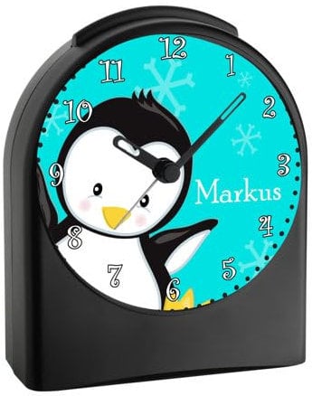 CreaDesign Kinder Funkwecker schwarz Pinguin Türkis