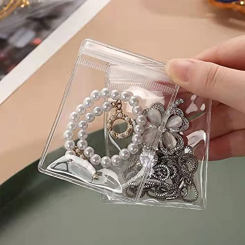100 bolsas reutilizables para joyas, paquete de plástico con cierre de cremallera, bolsa de almacenamiento de PVC transparente antioxidante para sostener anillos de joyería, pendientes, 7 x 10 cm