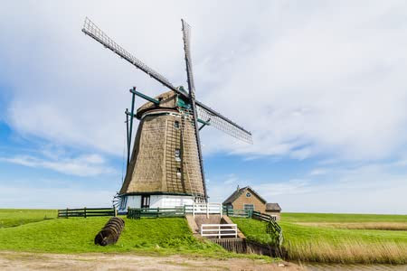 adrium Poster-Bild 140 x 90 cm: Niederländische Windmühle im Norden auf dem Texel Wadden Island in den Niederlanden.(101357972)