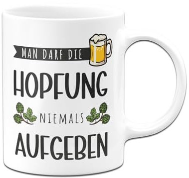 Tassenbrennerei Tasse - Man darf die Hopfung niemals aufgeben - Bier Kaffeetasse lustig mit Spruch - Geschenk für Mann, Männer - Bierglas (Weiß)