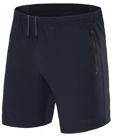 TCA Short Sport Homme Court - Short Homme Sport avec Poche Zipée - Bermuda de Running Léger Elite Tech Pas Cher - Vêtement en Polyester - Musculation - Fitness s - Bleu Foncé, XS