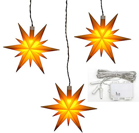 Dekohelden24 3er Set Weihnachtssterne aus Kunststoff in gelb, inkl. LED Beleuchtung und 6h Timer, für Batteriebetrieb, für Innen und Außen geeignet. Maße je Stern L/B/H: 13,5 x 5,5 x 12 cm.