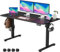 VOSATRON Elektrisch Höhenverstellbarer Schreibtisch 140x60cm Schreibtisch Höhenverstellbar mit Memory-Steuerung und Anti-Kollision Technologie, Rollen, Spleißbrett, Schwarz Rahmen/Schwarz Tischplatte