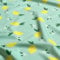 Stoff Meterware 0,5 m für Badeanzug Zitronen gelb grün Mint Badelycra elastisch Lichtschutzfaktor 50 Bikini