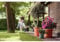 Elho Algarve Cilindro Wheels 48cm - Grand Pot de Fleurs Extérieur - Jardinières - Plastique 100% recyclé - Ø 48.0 x H 40.2 cm - Marron/Terre Cuite