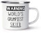 Emaille-Becher mit Aufschrift Warning World's Grumpiest Skier