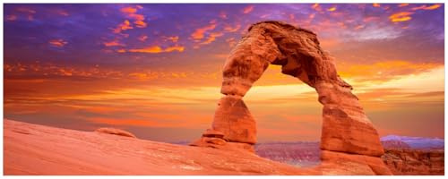 Wallario Küchenrückwand selbstklebend 115 x 50 cm, Motiv: Steinbogen vor einem farbenfrohen Himmel in lila-rot | Spritzschutz abwischbar & pflegeleicht