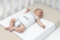 Snoozzz Schlafhilfe Travel für die Seitenlage und Ruckeinlage - Pucktuch - Lagerungskissen - für Wiege, Kinderbett und Einzelbett (regular)