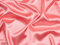 Minerva Tissu satiné extensible rose corail – au mètre