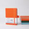 Irmanas A5 Notizbuch, Premium-Klassiker mit liniertem Papier und Stiftschlaufe, 160 Seiten, Leder-Hardcover-Journal, Business-Geschenk, Bürobedarf für Männer und Frauen (Orange).