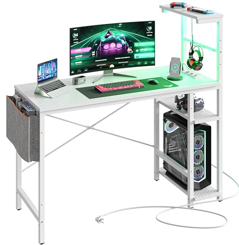 Bestier 113CM Eck-Computertisch mit Steckdosen Computertisch mit LED-Leuchten Umkehrbarer Schreibtisch mit Seitentasche Aufbewahrungstasche & Zubehöraufhänger für Home Office Small Space Weiß