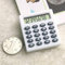 SUPERTOOL Mini calculatrice électrique portable blanche pour école primaire maison bureau 50 mm x 45 mm x 8 mm