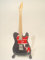 JONNY BUCKLAND Miniatur Gitarre COLDPLAY Blacky VIVA
