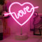 JEMESI Insegna luminosa al neon a forma di fiocco di Cupido, luci notturne al neon rosa alimentate da batteria/USB con base, decorazione da tavolo, ottimo regalo per famiglia, compleanni, vacanze