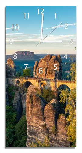 Wallario Design-Wanduhr Steinerne Brücke in der Landschaft aus Glas, Motiv-Uhr Größe 30 x 60 cm, weiße Zeiger