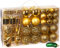 BRUBAKER 101 Stück sortierte Weihnachtskugeln - bruchsicher - mit grüner Gurke und Baumspitze - Designed in Germany - Golden