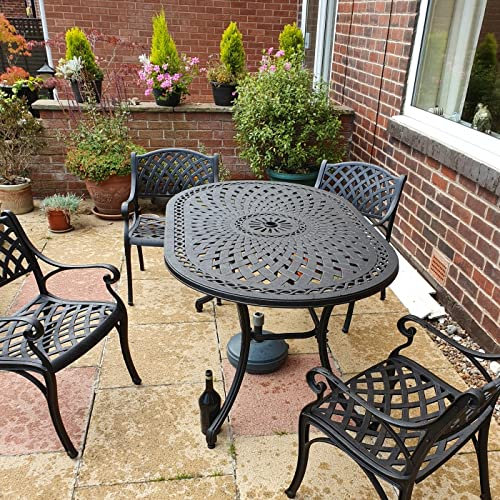 Lazy Susan 150 cm ovaler June Gartentisch in Antik Bronze mit 4 Kate Stühlen mit grünen Sitzkissen | Nachhaltiges Sandguss-Aluminium | Wetterfest | Rostfrei | Wartungsarm | 3 Jahre Garantie