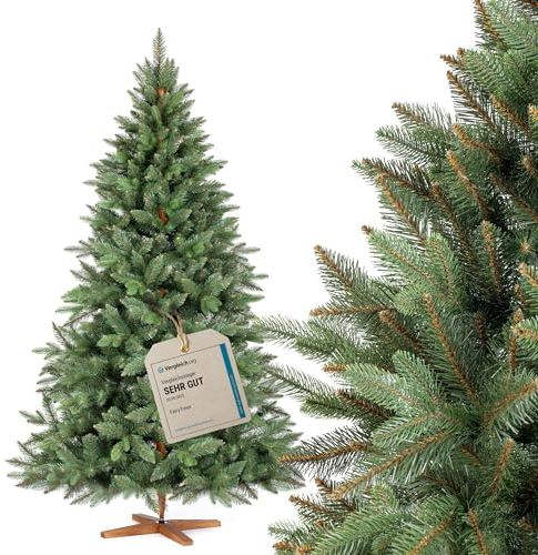 Albero FAIRYTREES Nordman Premium 180 cm, realizzato nell'UE. Albero di Natale artificiale formato da due materiali diversi, con supporto in frassino fatto a mano, tronco marrone.