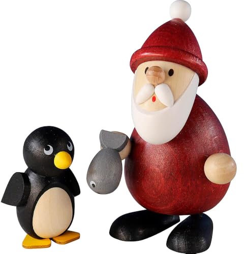 Erzgebirge Palast Ullrich Kunsthandwerk Weihnachtsmann mit Fisch und Pinguin - 9,5 cm