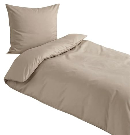 Traumschlaf Uni Mako-Satin Bettwäsche – seidig glatt & hautsympathisch aus 100% Baumwolle – edles Uni Design, atmungsaktiv & pflegeleicht – mit Reißverschluss – 140x200 cm + 70x90 cm, beige
