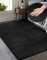 Mia´s Teppiche Luna kuschelig Warmer Fellteppich, weich und elegant, waschbar und Fußbodenheizung geeignet, Öko-Tex Zertifiziert, Schwarz, 70 x 140 cm