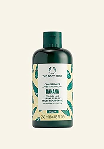 The Body Shop Banana Truly Nourishing Conditioner für trockenes Haar, das zu Frizz neigt, beschädigt, vegan, 250 ml