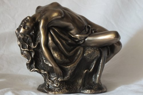 Statua in pietra bronzata