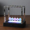 Newtons Cradle, Newtons LED Light Up Ball Kinetic Energy Cradle Home Science Toys Games Gift, Newtons Cradle Pendulum Balance Swing Ball Table Desktop Ornament for Home Office