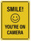 Smile you're on camera Metallschild mit lachendem Gesicht Kamera filmen lachen