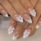 Goiern Lot de 24 faux ongles en forme d'amande acrylique avec design perlé, blanc, pointe française, réutilisables, longueur moyenne
