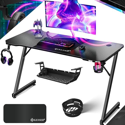 KESSER® Gaming Tisch 140cm x 60cm | Z-Form Gamer Schreibtisch | Kopfhörerhaken & Kohlebeschichtung | Ergonomischer PC Computertisch | Stabiler Tisch mit Getränkehalter Schwarz