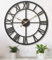 Pytha Sight 35cm Wanduhr Groß Wohnzimmer Modern,Römischen Ziffern Schwarz Wanduhr Metall Grosse Wanduhren für Küche,Büro,Schlafzimmer,Esszimmer