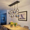 Qazqa - Art Deco Art-Deco-Hängelampe I Pendellampe I Pendelleuchte schwarz mit Rauchglas 8-flammig – Sandra I Wohnzimmer I Schlafzimmer - Länglich - LED geeignet E27