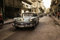 HAVANA Fototapete VLIES-400x260 cm (6559A)-Vintage Oldtimer Autos Altstadt Cuba Fotokunst Wandtapete-Inkl. Kleister-Vliestapete Bild Dekoration Wand-Dekor Moderne Motiv-Tapete Panorama Poster XXL