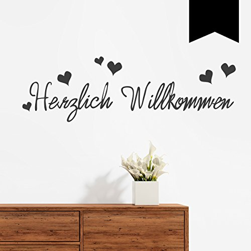 WANDKINGS Wandtattoo - Herzlich Willkommen (mit 6 Herzen) - 50 x 15 cm - Schwarz - Wähle aus 5 Größen & 35 Farben