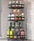 uyoyous Rotierender Gewürzregal Organizer, 360° Drehbarer Organizer 3 Etagen Drehteller Gewürzständer Drehen Kohlenstoffstahl Küche Gewürzregal für Gewürzgläser, Kosmetik, Reinigungsmittel - Schwarz