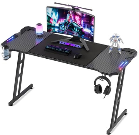 Kuro-sagol Mesa de ordenador con superficie de fibra de carbono y LED, escritorio para videojuegos, esports, estructura estable Z, gancho para auriculares para jugar, estudiar, color negro, 140 x 60